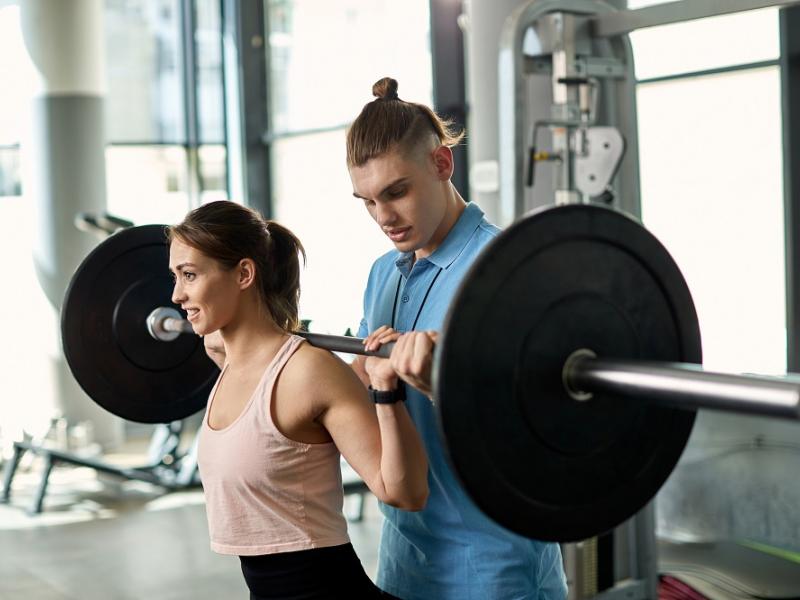 Women Lifting Weights with Personal Training